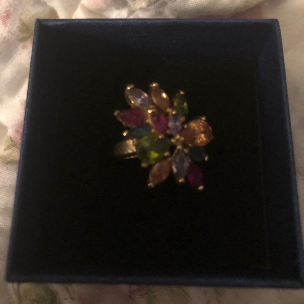 Brand new multi colored stones on gold color ring